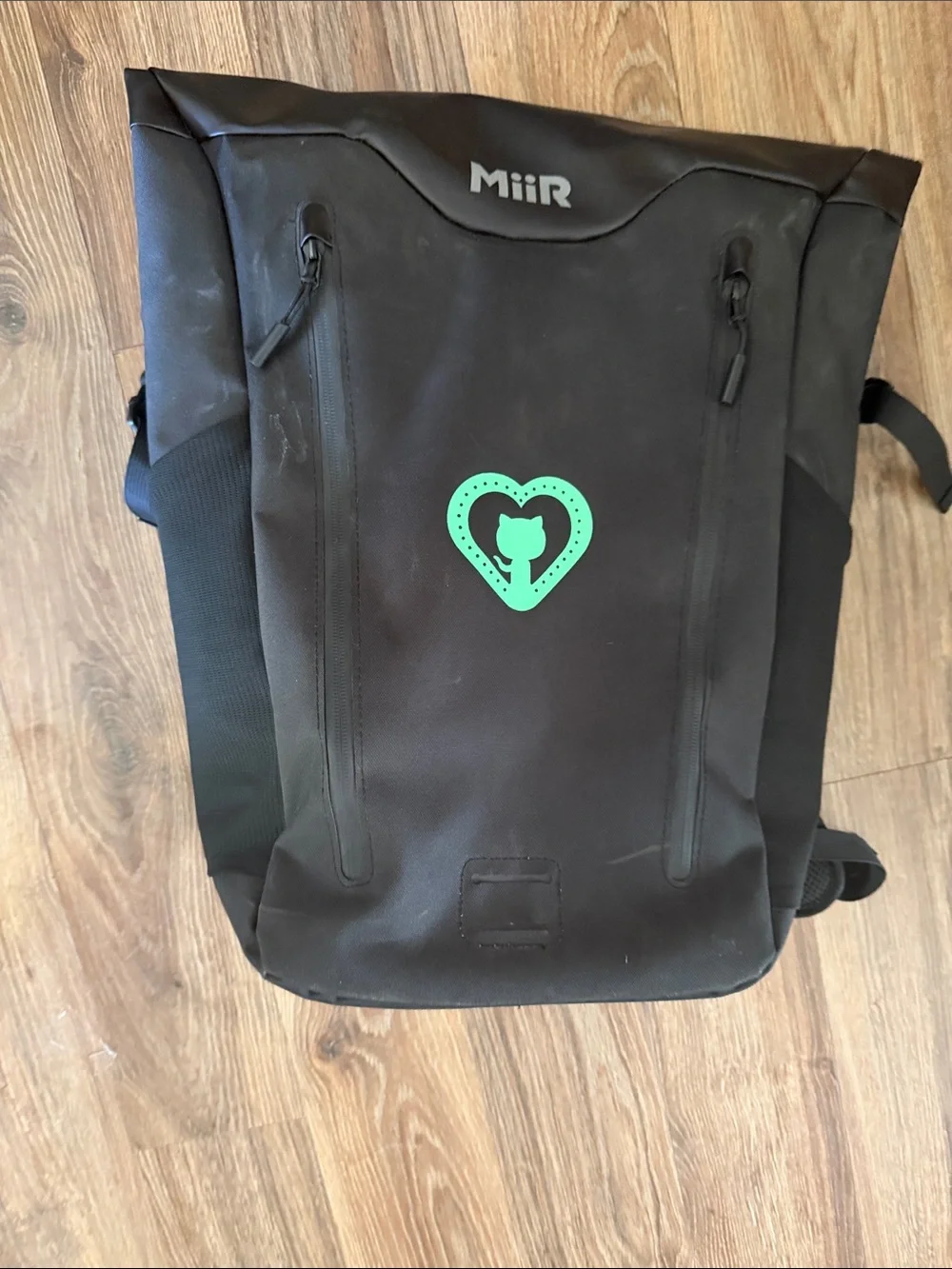 MiiR Black Roll-Top Backpack with Teal Heart Accent, recycled fabric
